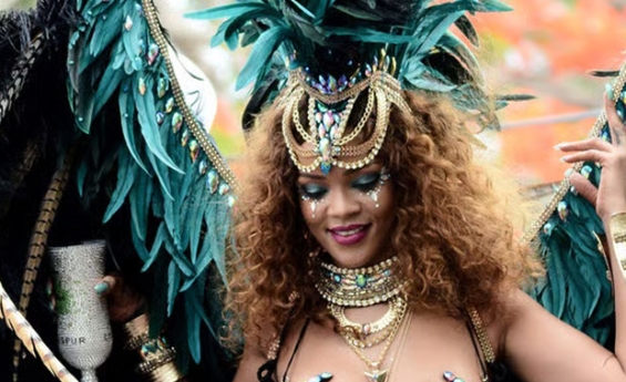 RIHANNA BARES SKIN WITH DARING JEWELED OUTFIT IN BARBADOS CARNIVAL
