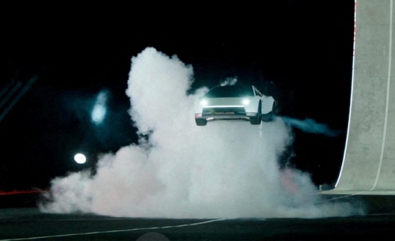 TESLA UNVEILS FUTURISTIC ROADSTER WITH MID AIR THRUSTERS