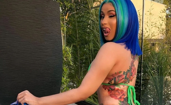 CARDI B UNVEILS BUTT CRACK PIERCING