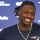 A.J. BROWN SHARES CHILDHOOD PHOTOS IN TOM BRADY JERSEY FOLLOWING PATRIOTS TRADE,