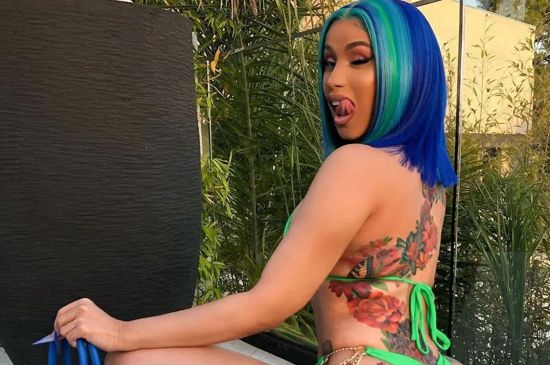 CARDI B UNVEILS BUTT CRACK PIERCING