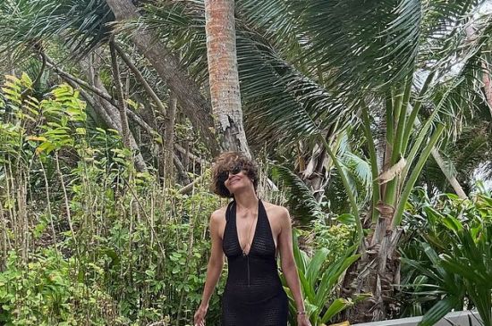 HALLE BERRY LOOKS HALF HER AGE AS SHE SAYS '60, HERE I COME' 